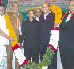 Ring of honour: Outer Delhi MP Sajjan Kumar, DPCC President Ram Babu Sharma and Congress leader Abhishekh Manu Singhvi being felicitated by the All India Vaish Aggarwal Samaj at a function in the Capital on Friday