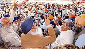 BJP leader Sahib Singh (left) and SAD supremo Parkash Singh Badal at a rally in Rajpura