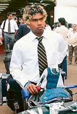 Sri Lankan bowler Lasith Malinga arrives at the Chhatrapati Shivaji International Airport in Mumbai on Friday.