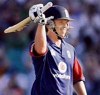 Englands Ed Joyce celebrates on completing his century during the tri-series one-dayer against Australia in Sydney on Friday. 