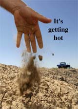Farmer Chris Priestley shows the dry soil on his drought-affected property near the outback town of Walgett, located in northwestern New South Wales on Friday.