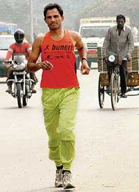 Race against time: Ultra-marathoner Arun Bhardwaj runs to set another record of sorts. He was in Chandigarh on his way to Shimla on Saturday.