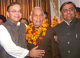 Mr Arun Jaitley, General Secretary, BJP, hugs Mr Raj Kumar Gupta, a sitting Congress MLA, at a function in Jalandhar on Saturday.