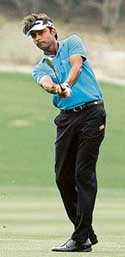 Jyoti Randhawa tees off at the first hole during the third round of the Dubai Desert Classic golf tournament on Saturday. 