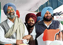 The Chief Minister, Capt Amarinder Singh, and the Congress candidate, Mahesh Inder Singh Badal, at an election rally in Lambi on Sunday