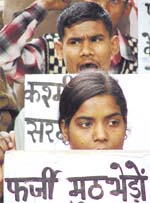 SUCI activists demonstrating against fake encounters in Kashmir at Jantar Mantar in the Capital on Wednesday