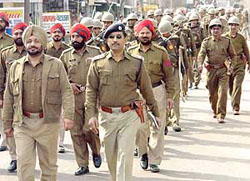 Securitymen hold a flag march in Ferozepore