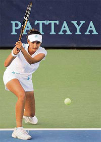 Sania Mirza in action against Thailands Tamarine Tanasugarn in the second round of the Pattaya Open