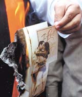 February Pastime: Shiv Sena activists burning Valentines Day greeting cards in the Capital
