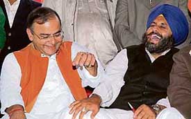 BJP leader Arun Jaitley with SAD general secretary Sukhbir Badal during the election campaign at Majitha, near Amritsar, on Friday. 