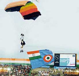 A stuntman of the Indian Air Force paradives during the opening ceremony of the 33rd National Games in Guwahati on Friday