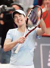 Belgian Justine Henin celebrates after defeating French Tatiana Golovin in the quarterfinal of the WTA Paris Open tennis tournament on Friday.