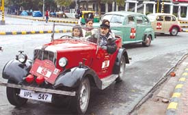 Vintage cars passing through Connaught Place during the 41st Statesman Vintage and Classic Car Rally in the Capital on Sunday