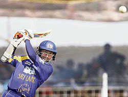 Sri Lankas Kumar Sangakkara plays a shot during the second one-dayer against India in Rajkot 