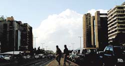 White clouds descend over Barakhamba Road in the heart of Delhi, leading to rains and dipping of temperatures in the Capital