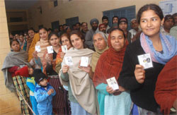 Despite the rain and the chill, women came out in strength to vote