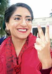 The daughter-in-law of Chief Minister Amarinder Singh, Ms Rishma, makes the victory sign