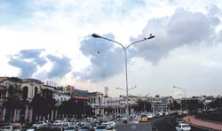 Grey clouds hovering over the skies of Connaught Place in the Capital, threatening another wet spell in the Capital