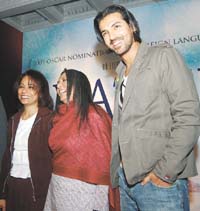 Deepa Mehta (centre), director of the film, Water, which has been nominated for the Oscars, with John Abraham and Seema Biswas at a press conference in the Capital 