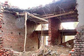 Shops that have been demolished by the Pathankot Improvement Trust authorities.