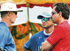 Selection committee chairman Dilip Vengsarkar (right) in conversation with Indian skipper Rahul Dravid (centre) and coach Greg Chappell in Visakhapatnam on Friday.