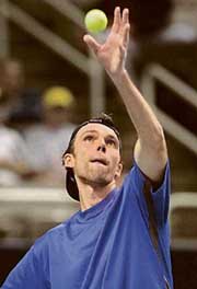 Ivo Karlovic of Croatia serves to James Blake of the US in the second round of the SAP Tennis Open in San Jose, California, on Thursday. Karlovic won 6-7, 7-6, 6-4.