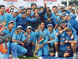 Team India celebrates with the trophy after beating Sri Lanka in the fourth one-dayer in Visakhapatnam 