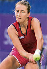 Mara Santangelo of Italy plays a shot during her semifinal match against Olga Savchuk of Ukraine in Bangalore 