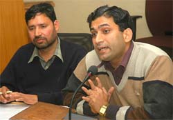 Mr Gautam Lal (left) officiating General Manager BSNL and Mr Rajiv Goyal, DGM, Marketing, during a press conference in Jalandhar on Monday. 