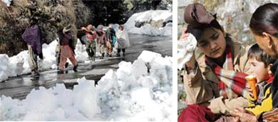 A week after Shimla experienced its heaviest snowfall in 99 years, a child enjoys ice cream on the Mall on Tuesday