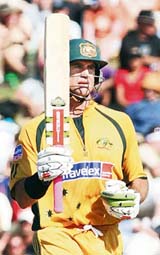 Australias Matthew Hayden acknowledges the crowd on completing his century in the third match against New Zealand in Hamilton