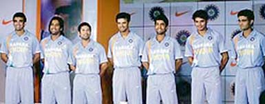 Indian cricketers (from left) Zaheer Khan, Mahendra Singh Dhoni, Sachin Tendulkar, Rahul Dravid, Dinesh Karthik, S. Sreesanth and Sourav Ganguly wear the official team uniform for the upcoming World Cup at a function in Mumbai