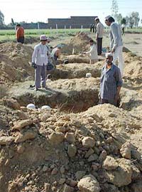 Graves being readied for victims of the Delhi-Attari Express blasts at Mehrana village near Panipat