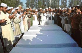 A prayer being conducted for six victims of the Samjhauta Express blasts at Mehrana village near Panipat