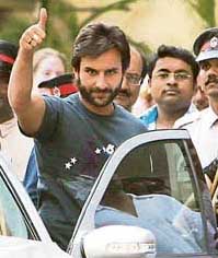 Actor Saif Ali Khan shows a thumbs up sign to the waiting media after he was discharged from Lilavati Hospital in Mumbai
