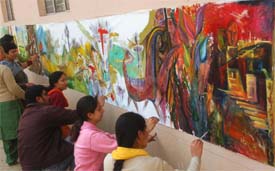 For the sake of art: Fifteen artists came together under the aegis of Art Dot to paint two large canvases on Sunday.
