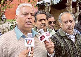 The father of Rajan Bala talks to mediapersons in Pathankot