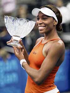 Venus Williams holds the trophy after defeating Shahar Peer 6-1, 6-1 in the final of the Cellular South Cup in Memphis, Tennessee, on Saturday