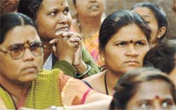 Anganwadi workers sit on dharna at Jantar Mantar in the Capital on Monday.