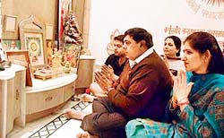 Seeking divine intervention: Surinder Dawar, Congress nominee from Ludhiana East, offers prayers on the eve of the declaration of Punjab Assembly election results in Ludhiana