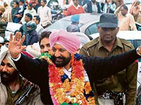 Balbir Singh Sidhu and his supporters enjoy victory celebrations in Mohali 