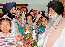 Capt Kanwaljit Singh, SAD-BJP candidate from Banur, celeberates his victory with family members at his residence in  Sector 9, Chandigarh