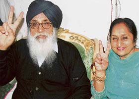 SAD supremo Parkash Singh Badal makes the victory sign during a press conference in Malout