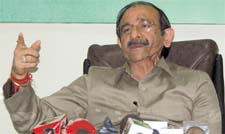 DPCC president Ram Babu Sharma addressing a press conference in the Capital on Wednesday.