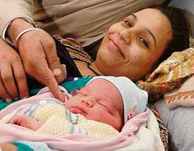 Sarvpreet Kaur with her newborn son at a hospital in Chandigarh on Thursday.
