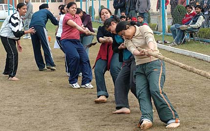 Students of the DAV Institute of Engineering and Technology participate in a tug-of-war during their annual sports meet in Jalandhar on Wednesday.