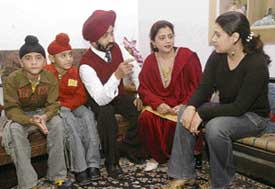 B. S. Ahuja, his wife Harvinder and their children Harveen