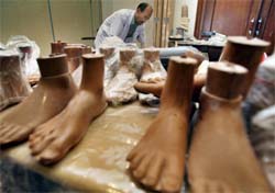 A group of prosthetic makers from India produce artificial legs in Jakarta on Thursday. An Indian-Indonesian foundation has contributed more than 200 prosthetic limbs for disabled people in Indonesia, a place where some 5 per cent of the people or some 11 million, are classified as disabled 