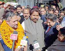Narinder Singh Jamwal of the Congress with his supporters after filing papers for the post of mayor of the Jammu Municipal Corporation in Jammu on Friday.