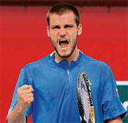 Mikhail Youzhny of Russia reacts during his semifinal match against Swedens Robin Soderling at the Dubai Open